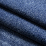 Gabriela – Jeans oscuros con adornos de tachuelas