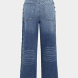 Gabriela – Jeans oscuros con adornos de tachuelas