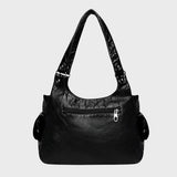 Carolina – Elegante bolso vegano con detalle en forma de corazón