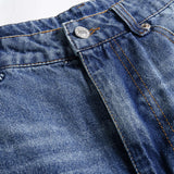 Gabriela – Jeans oscuros con adornos de tachuelas